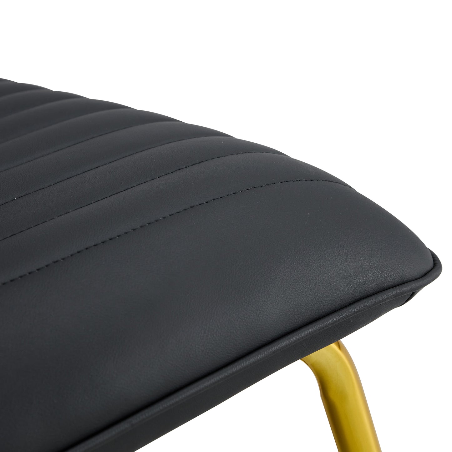 Black minimalist armless sofa chair with PU backrest and golden metal legs suitable for offices restaurants